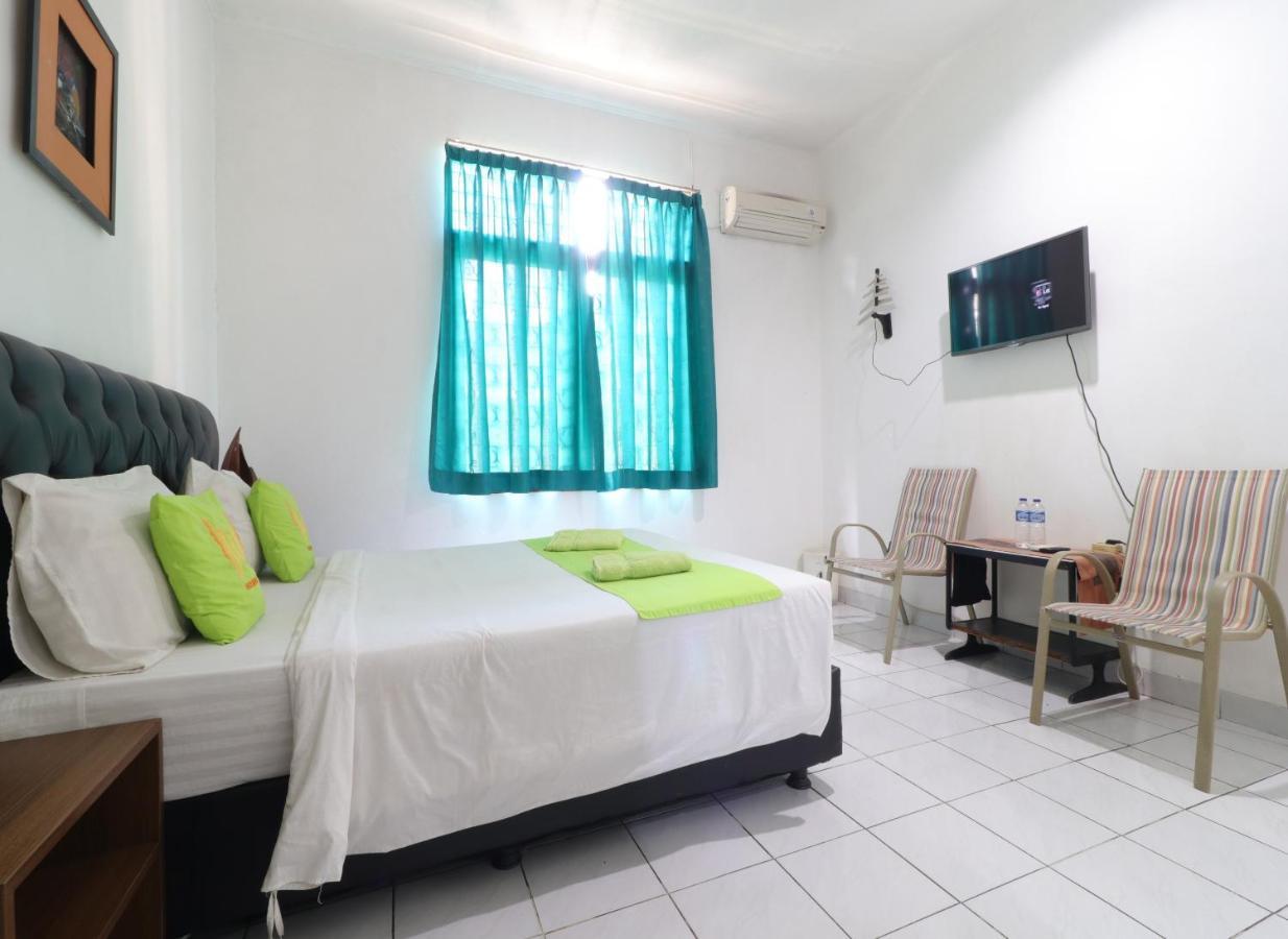 Hotel Huswah Airport Тангеранг Экстерьер фото